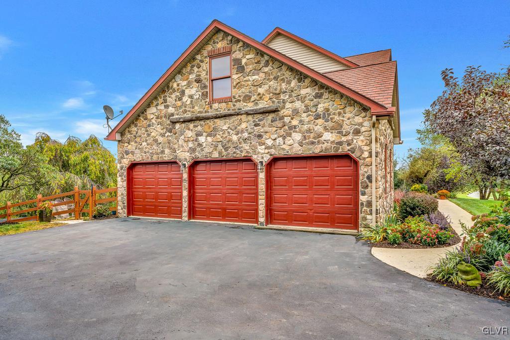 131 Blackstone Drive Wind Gap, PA 18091 - Photo 6 of 50 front view of a house with an garage