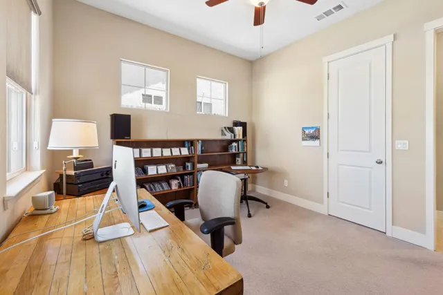 a kitchen with a sink stove and refrigerator