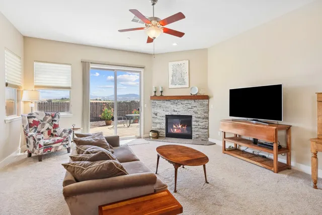 a bathroom with a shower curtain and a sink
