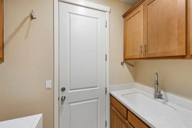 a room with a window and a chair