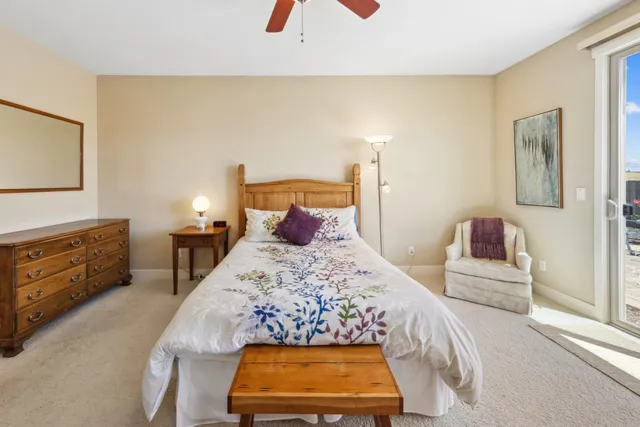 a bathroom with a sink a bathtub and a window