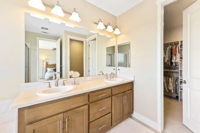 a view of roof deck with a barbeque and wooden fence