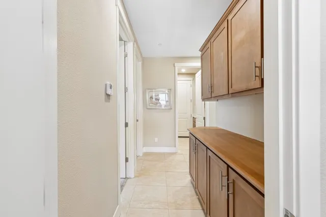 a view of a house with backyard porch and sitting area