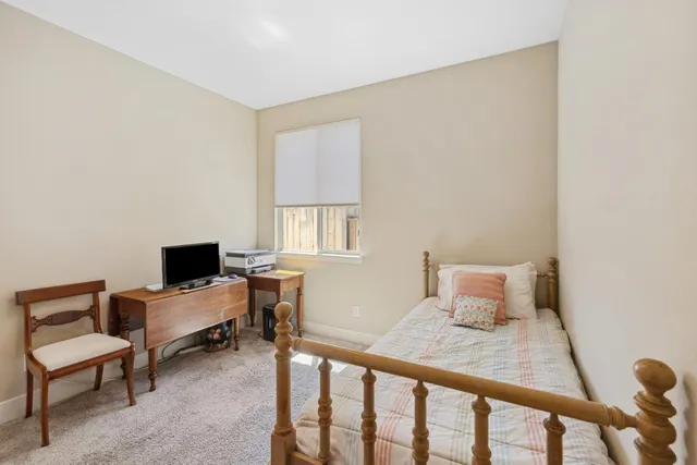 a room with lots of potted plants