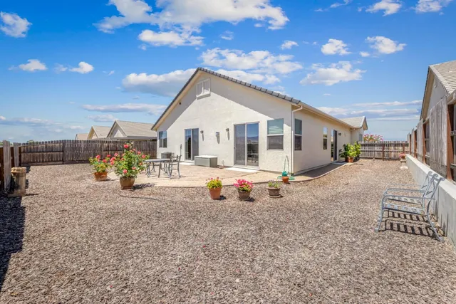 a front view of a house with a ocean view