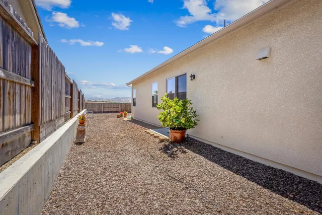 an aerial view of a house with lake view