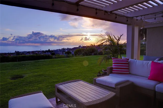 a view of a outdoor sitting area with furniture