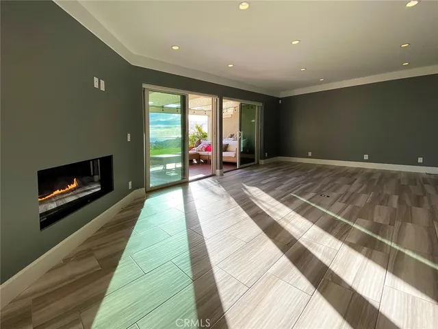 a bedroom with a bed and a fireplace