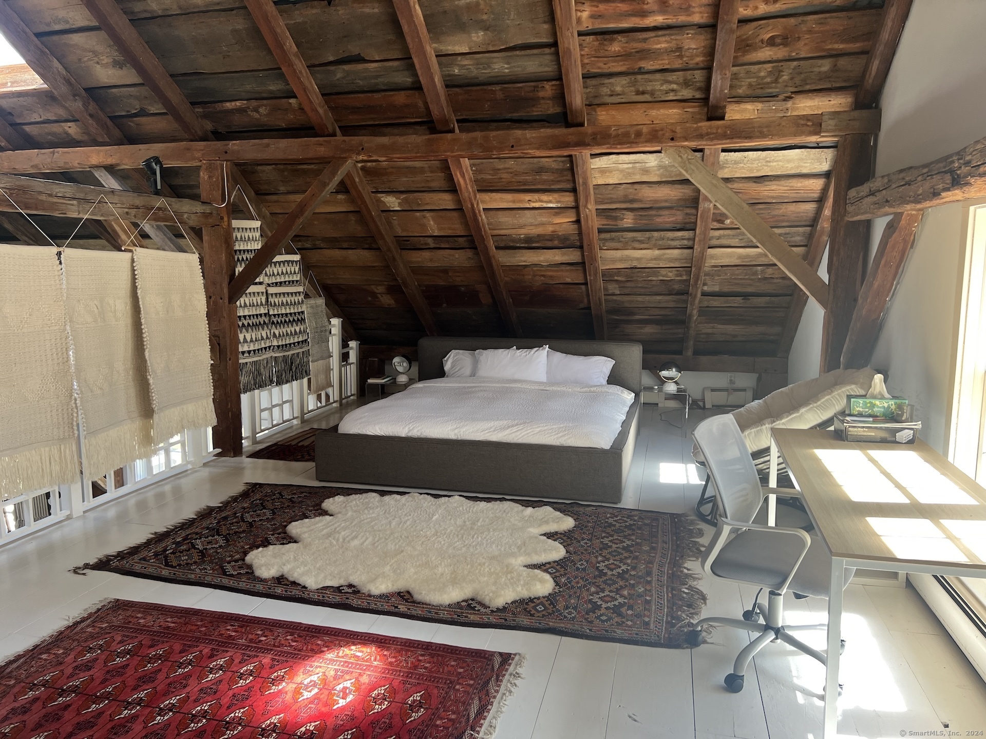 18 Bear Burrow Road Roxbury, CT 06783 - Photo 11 of 17 a room with water heater and racks