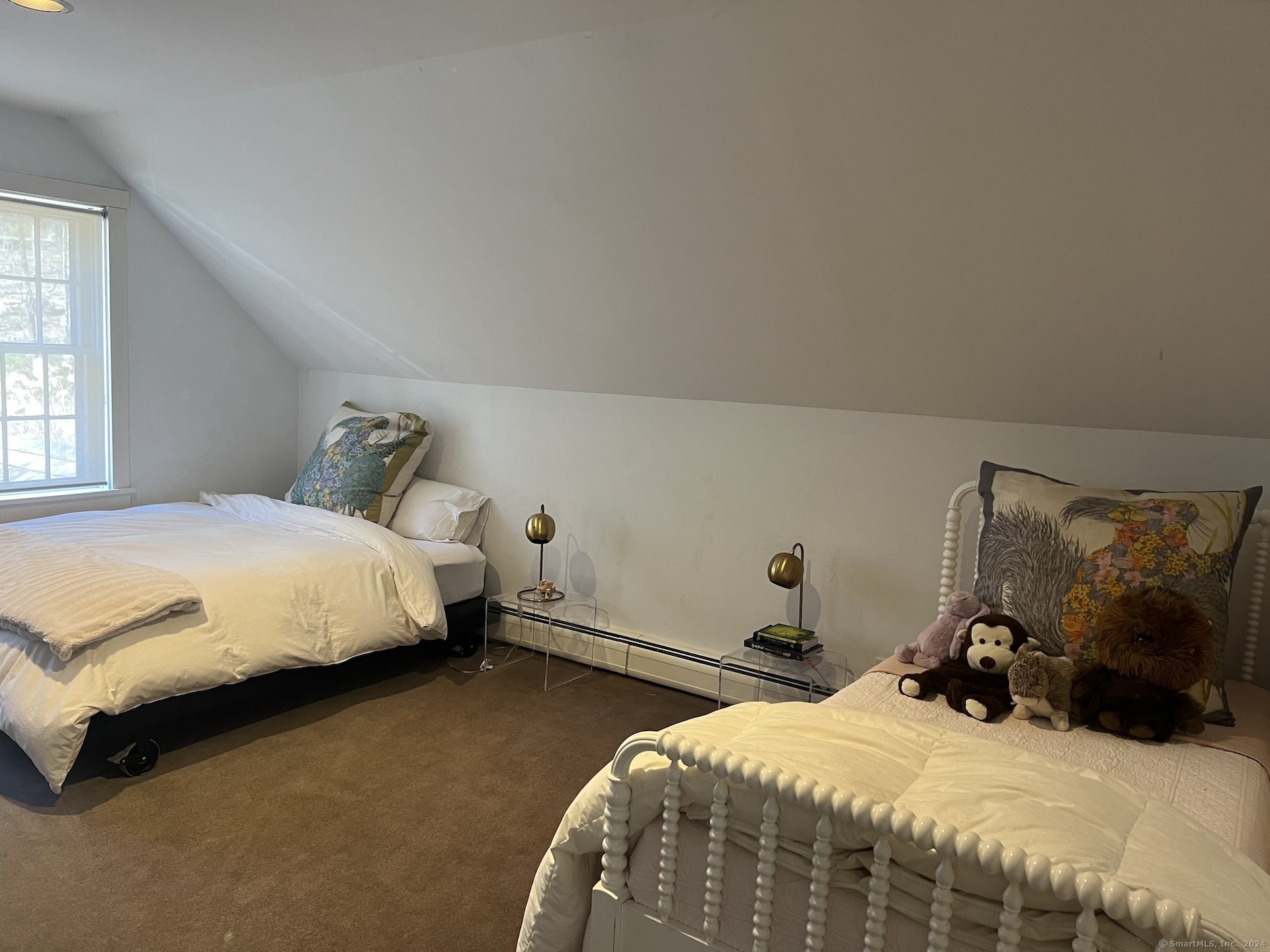 18 Bear Burrow Road Roxbury, CT 06783 - Photo 16 of 17 a bedroom with a bed and window