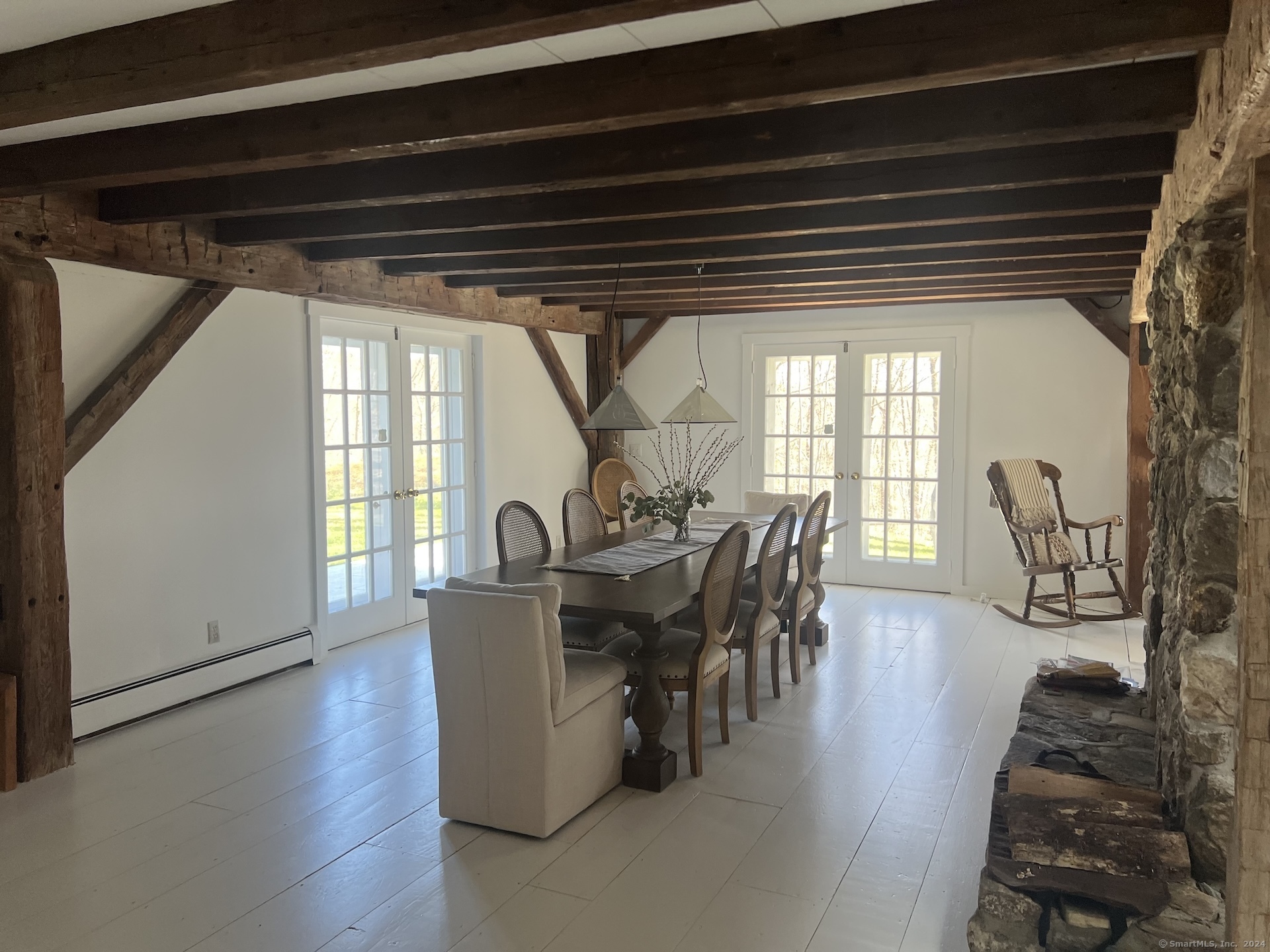 18 Bear Burrow Road Roxbury, CT 06783 - Photo 9 of 17 a dining room with furniture and wooden floor