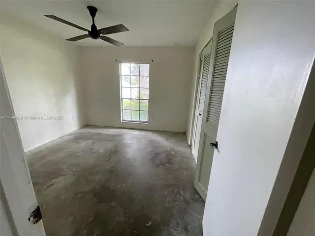 a kitchen with a sink and a stove top oven