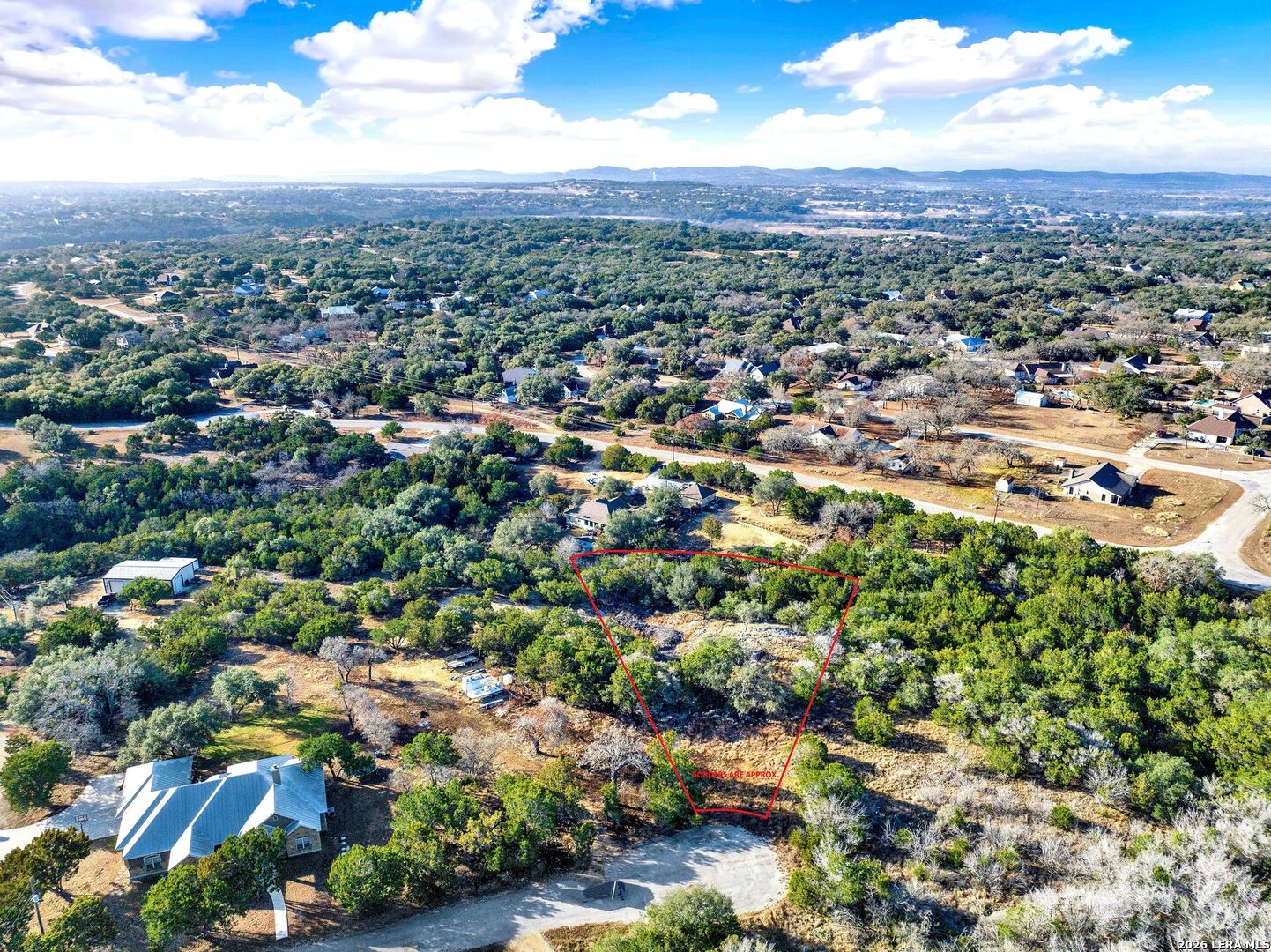 145 Elm Drive Bandera, TX 78003 - Photo 3 of 13 an aerial view of multiple house