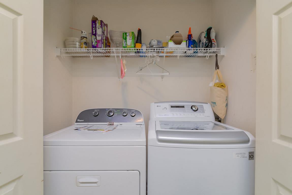 3387 Mahlon Moore Road Spring Hill, TN 37174 - Photo 16 of 29 a utility room with dryer and washer