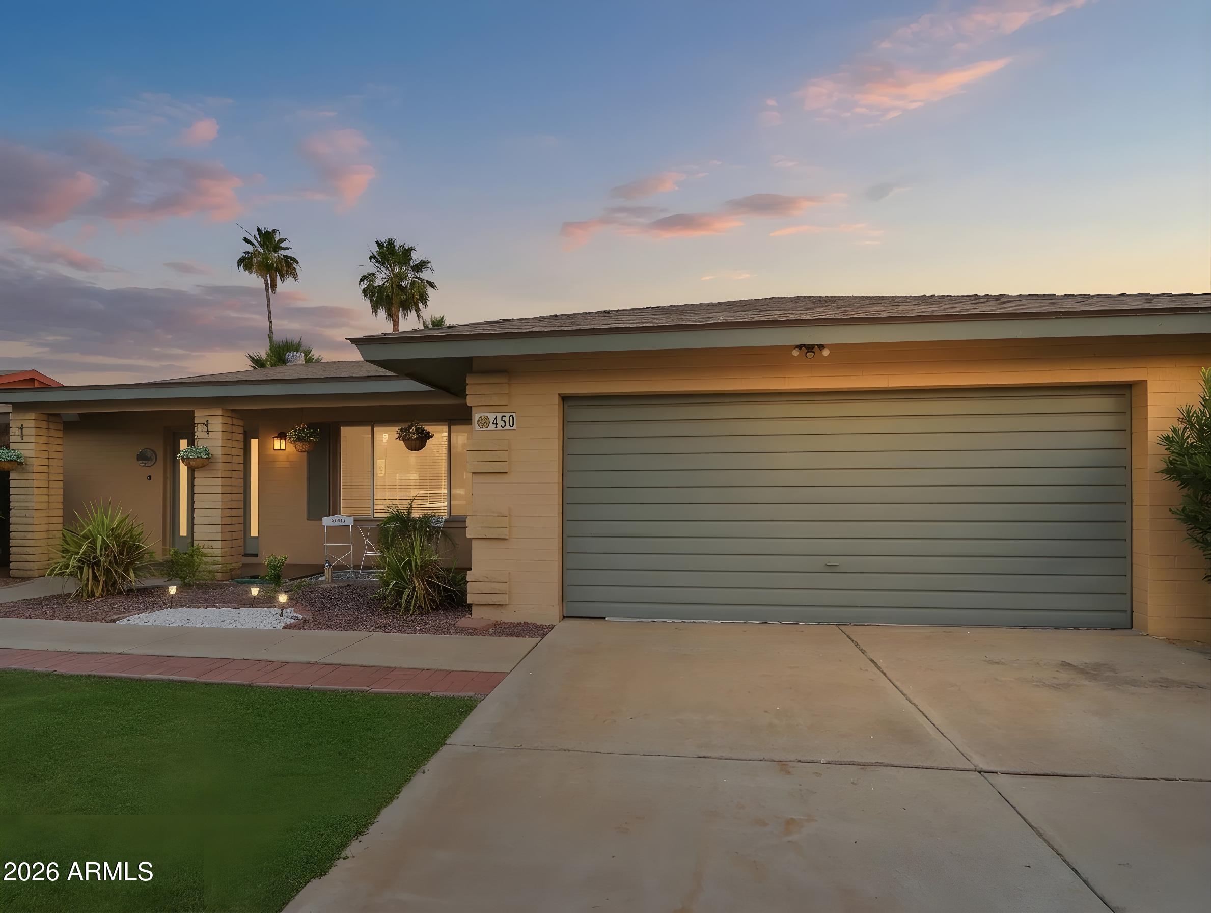 450 Cascada Road Litchfield Park, AZ 85340 - Photo 36 of 40 a front view of house with yard
