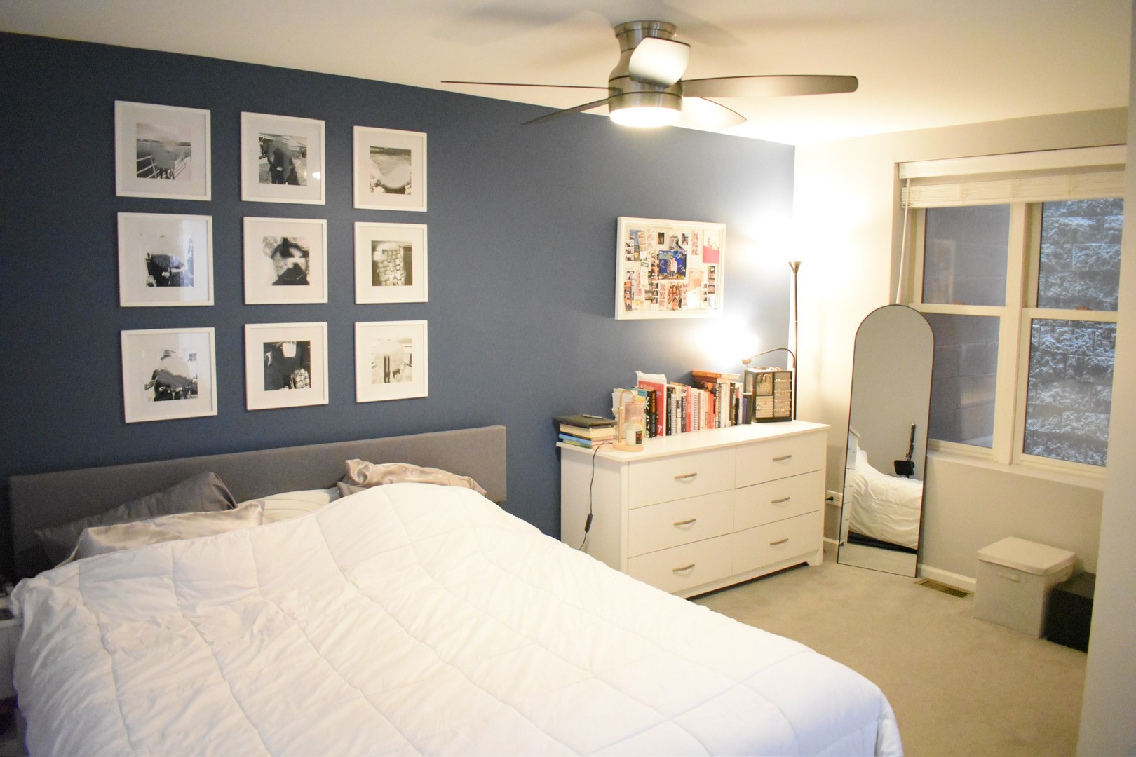 2851 North Southport Avenue, Unit A Chicago, IL 60657 - Photo 3 of 12 a bedroom with a bed and a window