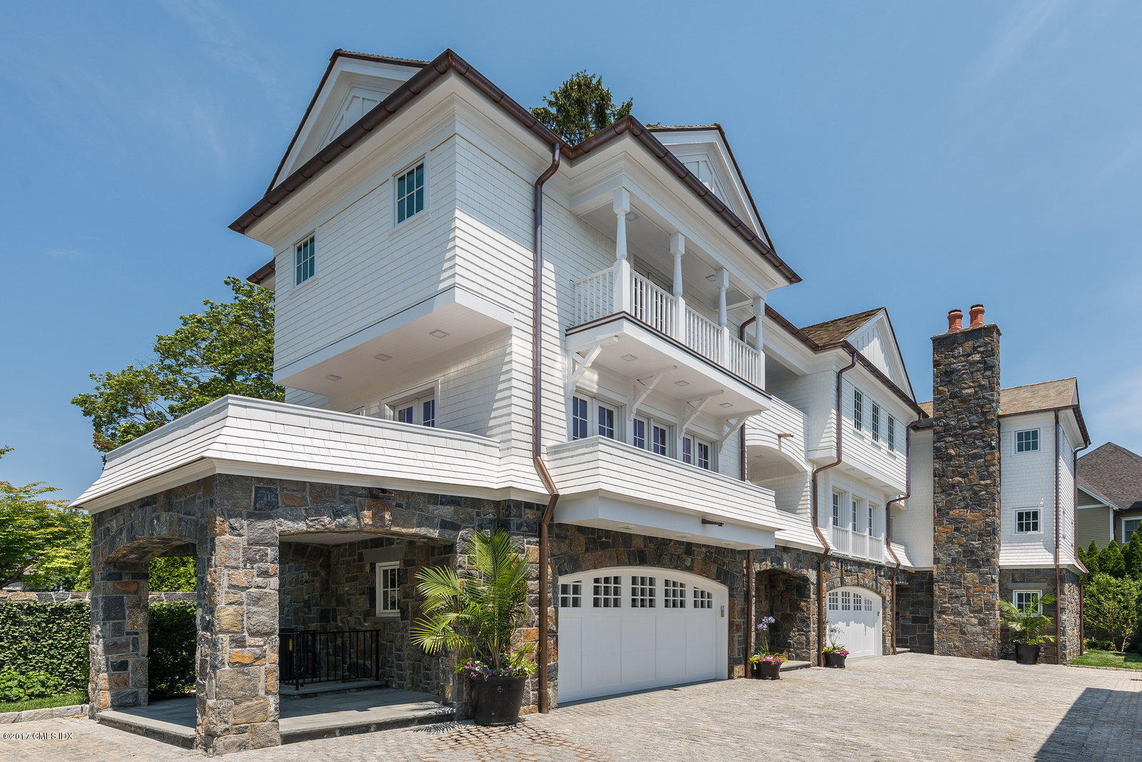 111 Mason Street, Unit 2A Greenwich, CT 06830 - Photo 1 of 18 a front view of a building with street