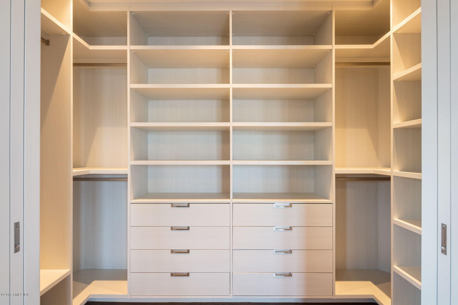 111 Mason Street, Unit 2A Greenwich, CT 06830 - Photo 10 of 18 a view of walk in closet with empty racks