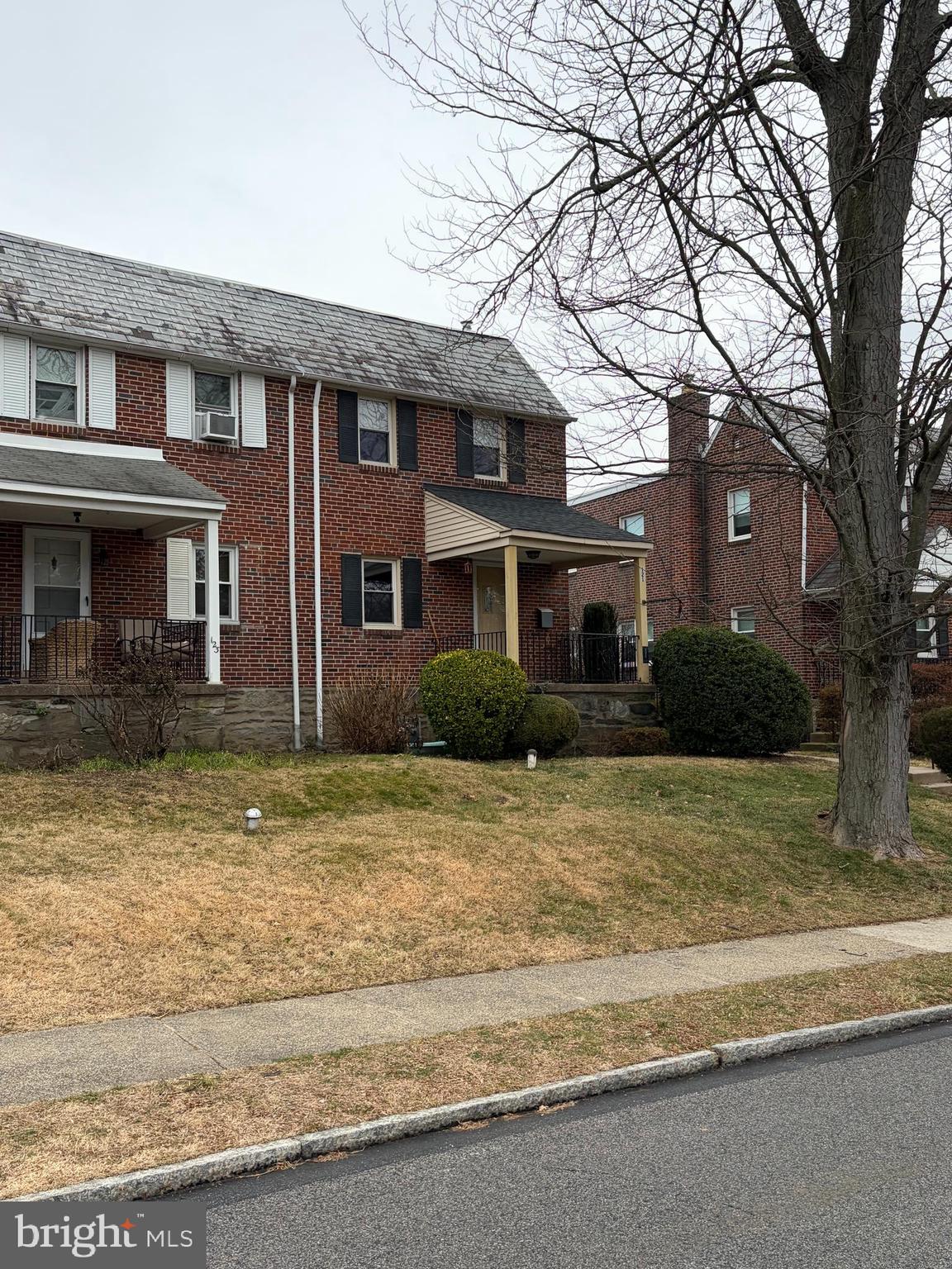 121 Rockglen Road Wynnewood, PA 19096 - Photo 1 of 13 a front view of a house with garden