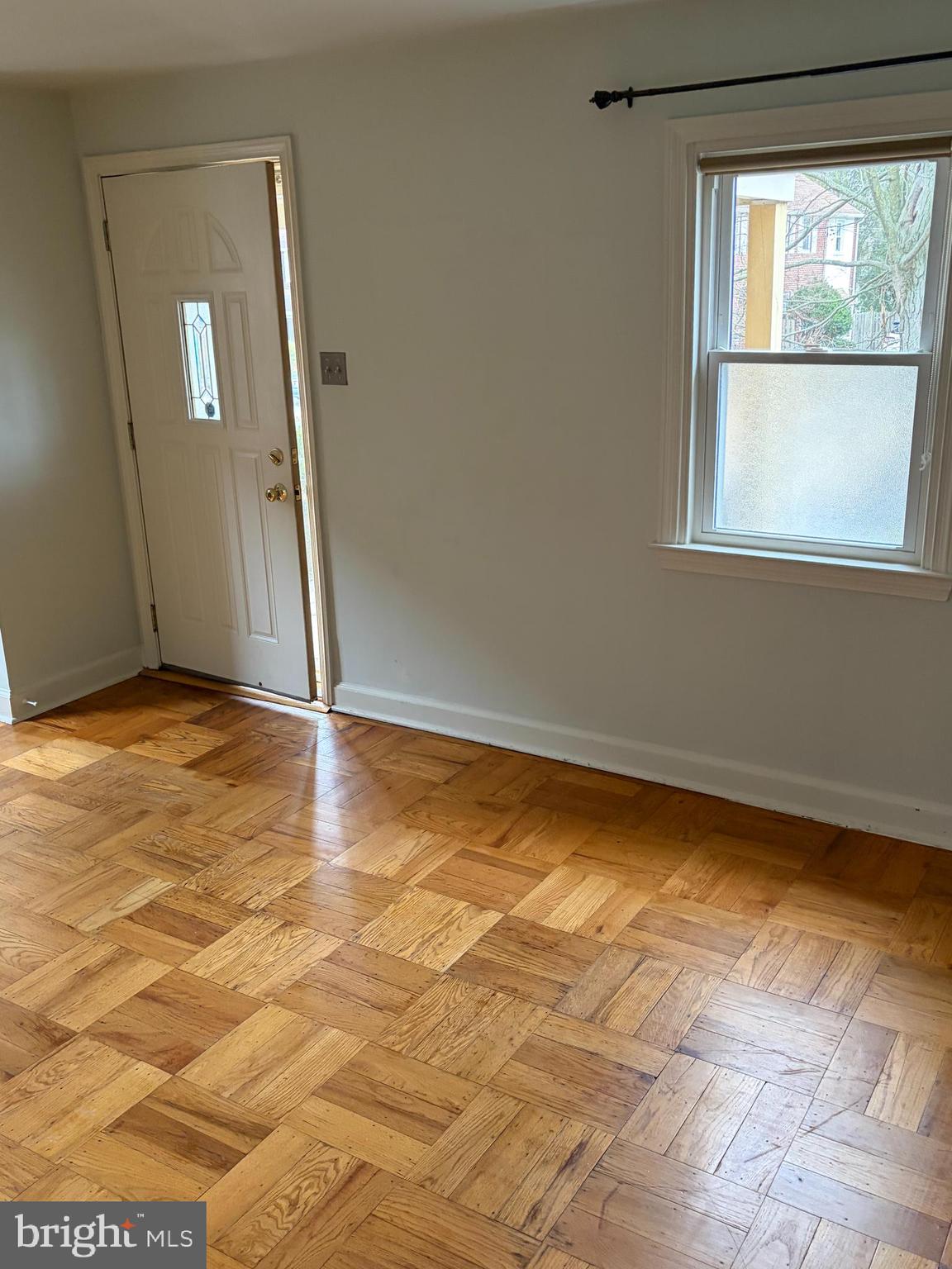 121 Rockglen Road Wynnewood, PA 19096 - Photo 3 of 13 a view of an empty room with a window
