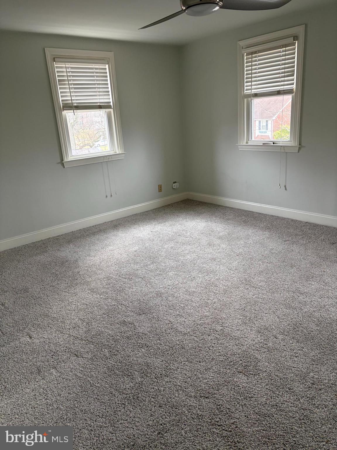 121 Rockglen Road Wynnewood, PA 19096 - Photo 8 of 13 an empty room with windows