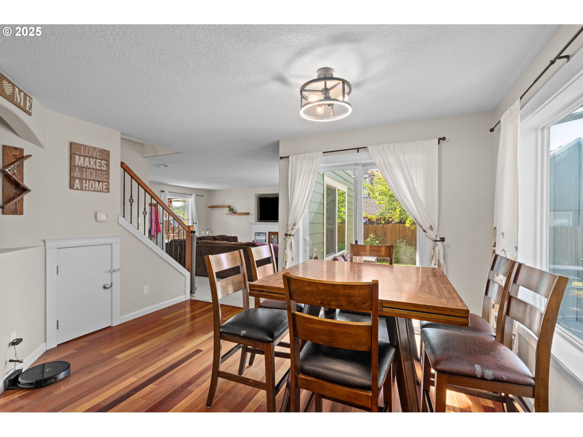 720 East Azalea Street Yamhill, OR 97148 - Photo 19 of 48 a view of a dining room with furniture window and wooden floor