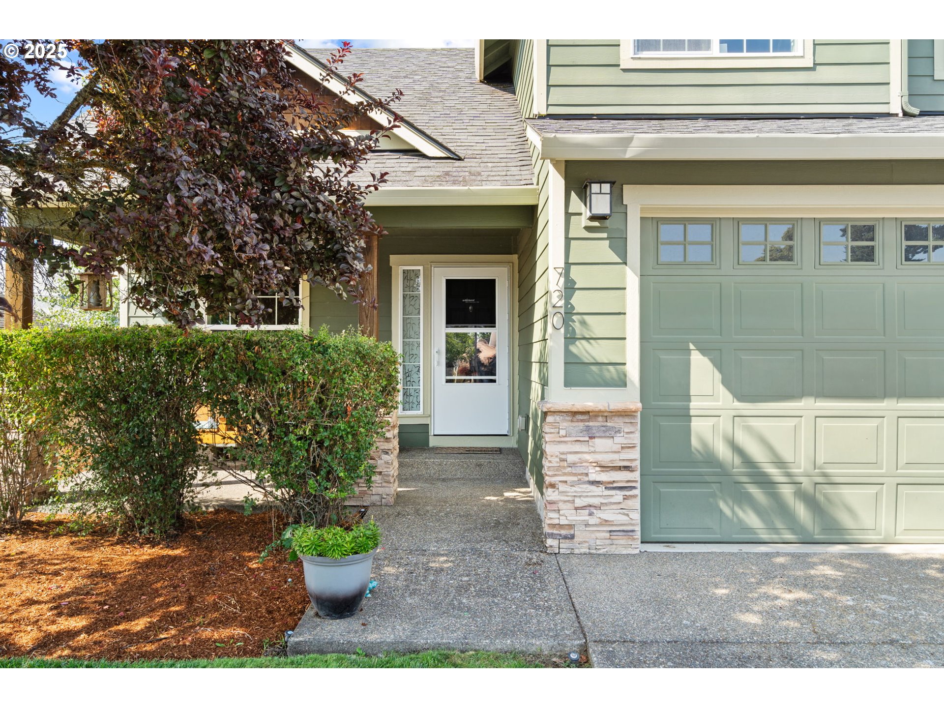 720 East Azalea Street Yamhill, OR 97148 - Photo 3 of 48 a front view of a house with a garden