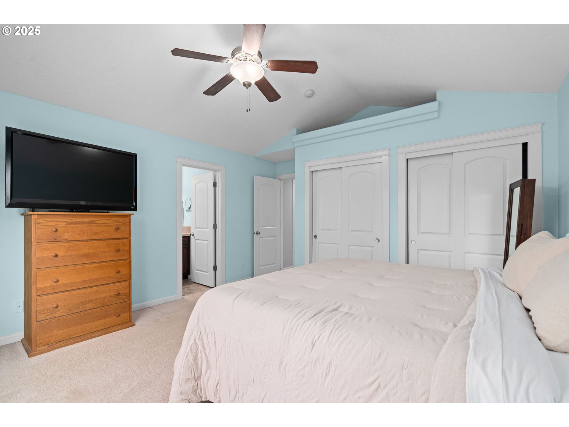 720 East Azalea Street Yamhill, OR 97148 - Photo 31 of 48 a bedroom with a bed a flat screen tv and a dresser