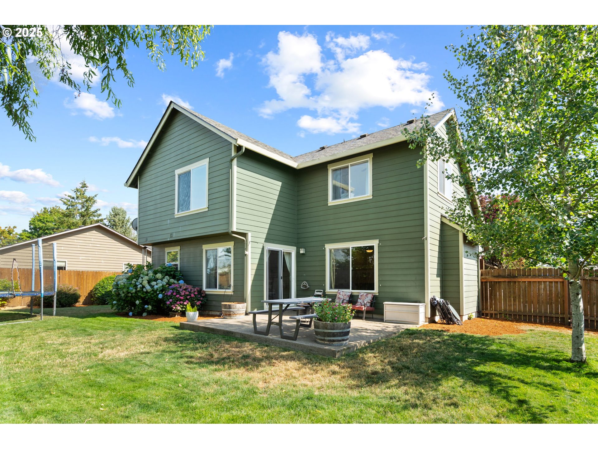 720 East Azalea Street Yamhill, OR 97148 - Photo 38 of 48 a front view of a house with garden