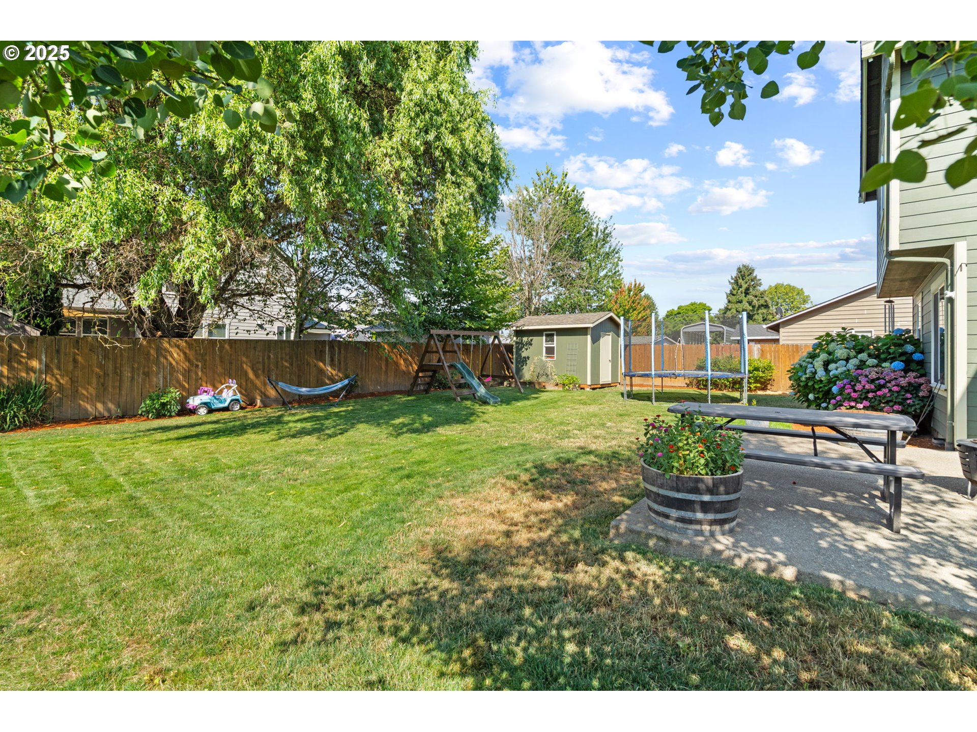 720 East Azalea Street Yamhill, OR 97148 - Photo 41 of 48 a view of a house with a yard