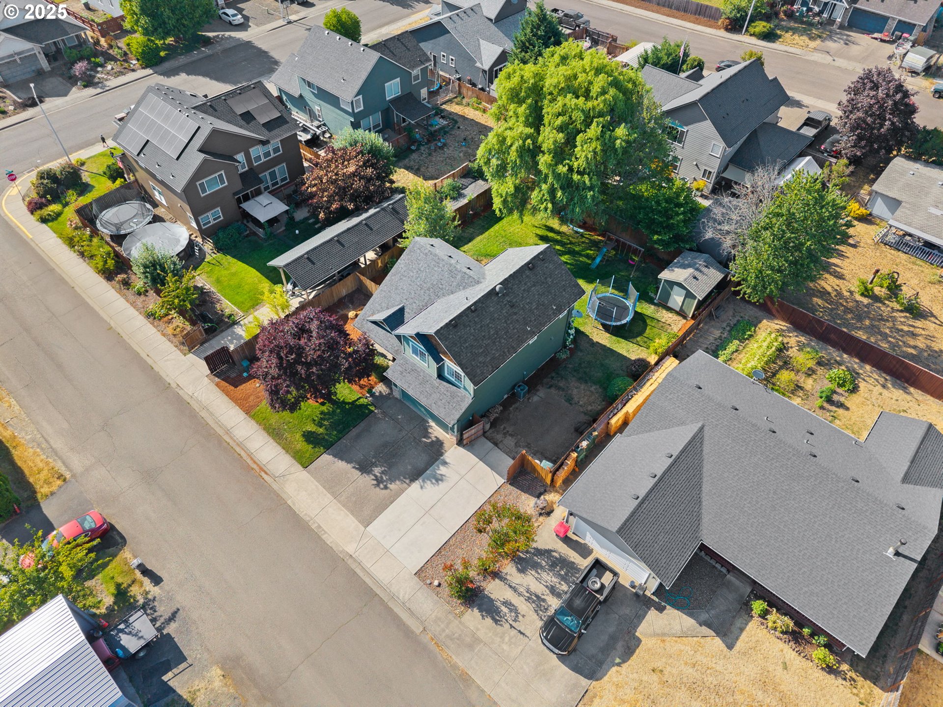 720 East Azalea Street Yamhill, OR 97148 - Photo 46 of 48 an aerial view of a house with a garden and swimming pool