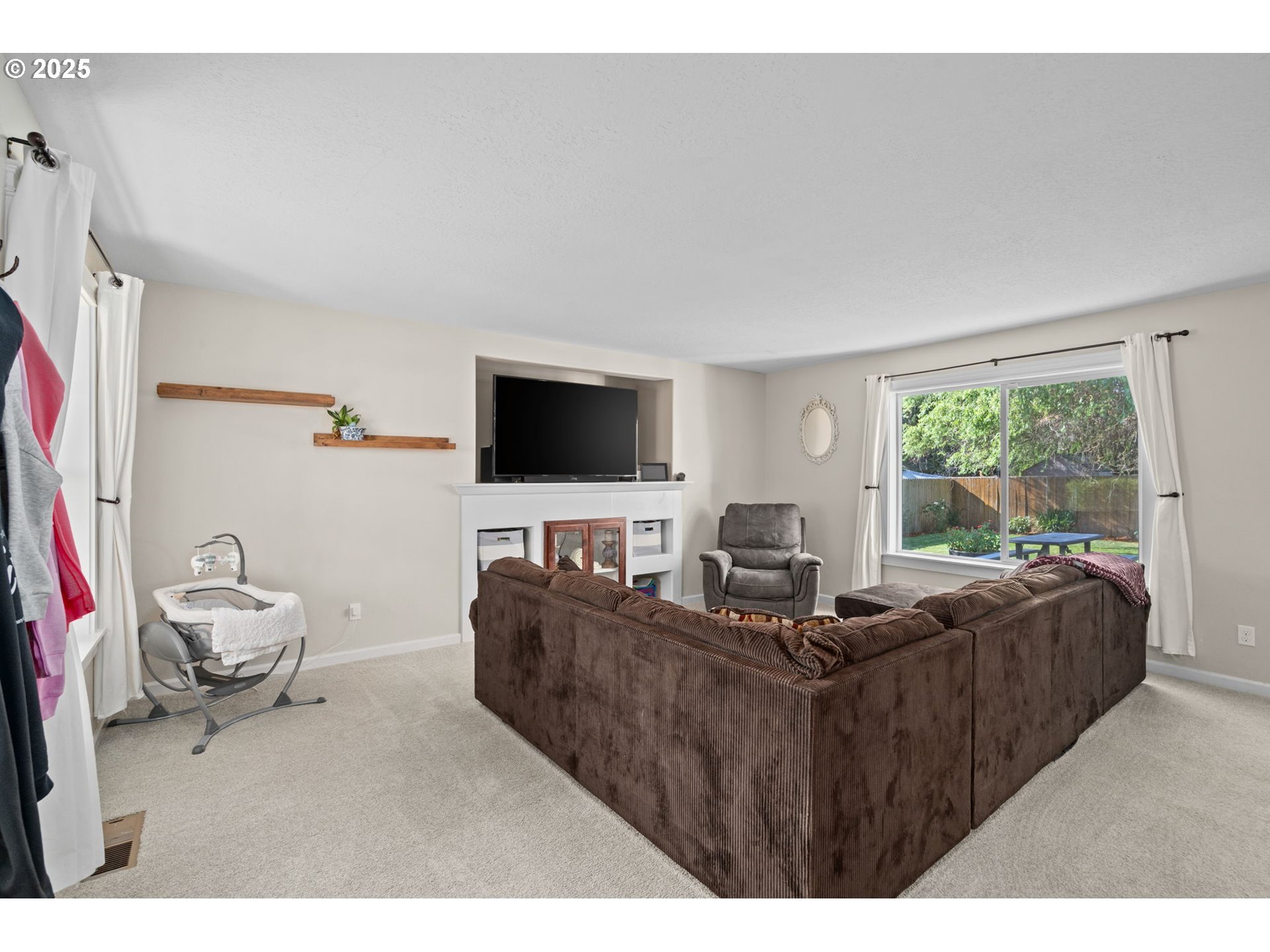 720 East Azalea Street Yamhill, OR 97148 - Photo 6 of 48 a living room with furniture and a flat screen tv