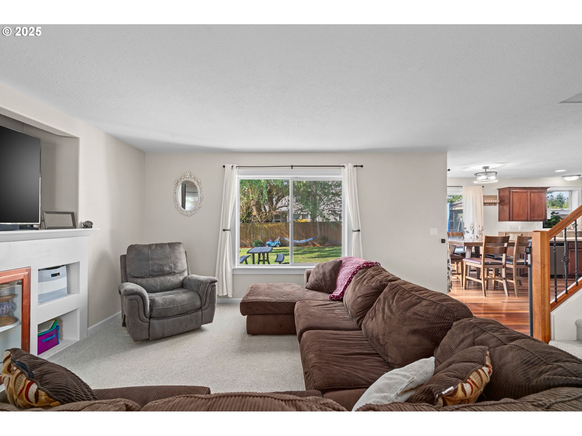 720 East Azalea Street Yamhill, OR 97148 - Photo 9 of 48 a living room with furniture and a flat screen tv