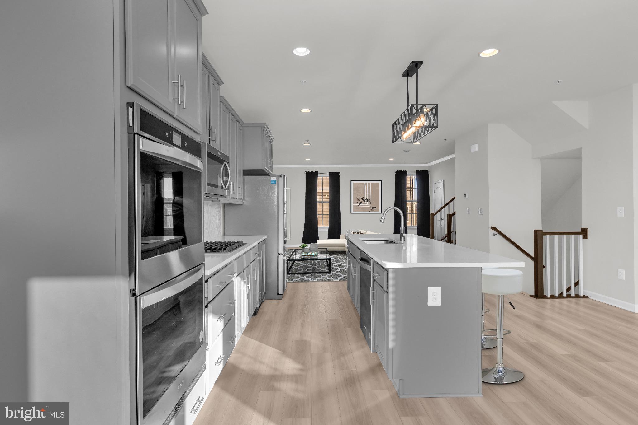 1106 Overlook Loop Laurel, MD 20707 - Photo 14 of 66 Sleek modern kitchen with elegant finishes.