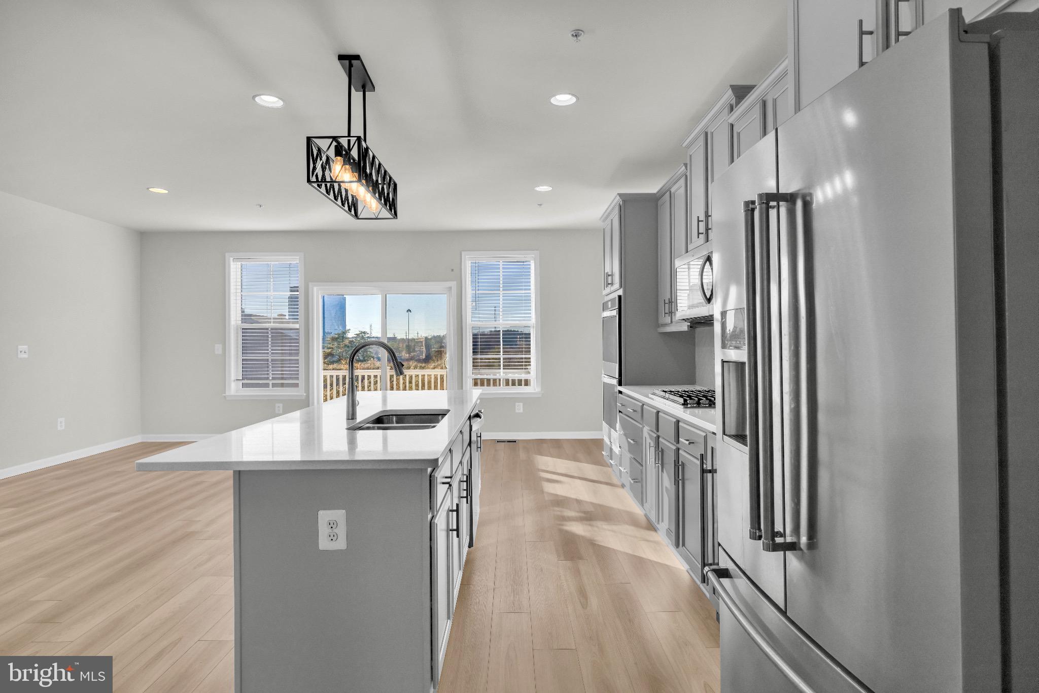 1106 Overlook Loop Laurel, MD 20707 - Photo 15 of 66 Modern kitchen with bright, airy ambiance.