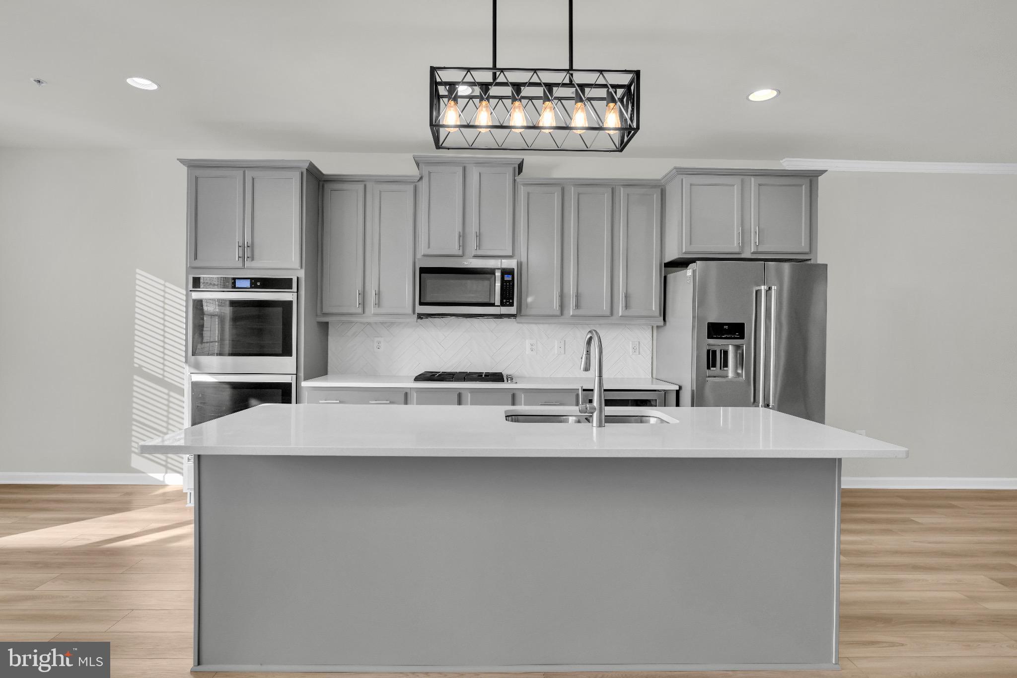 1106 Overlook Loop Laurel, MD 20707 - Photo 20 of 66 Modern kitchen with sleek finishes.