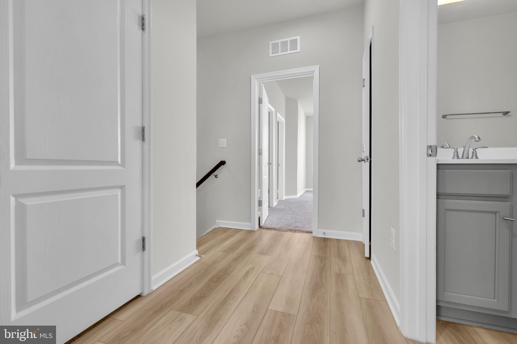 1106 Overlook Loop Laurel, MD 20707 - Photo 32 of 66 Inviting hallway with modern finishes.