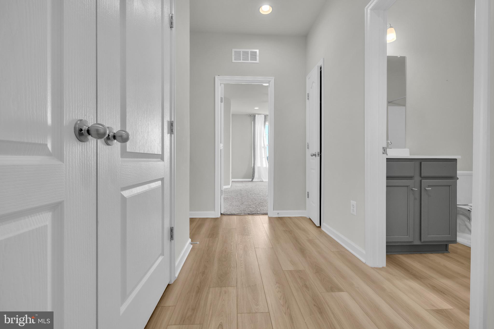 1106 Overlook Loop Laurel, MD 20707 - Photo 33 of 66 Bright and inviting hallway with modern finishes.