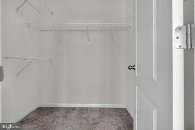a black and white photo of a living room