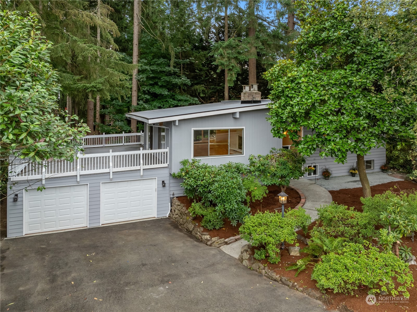 2130 242nd Street Southwest Bothell, WA 98021 - Photo 1 of 40 front view of a house with a yard
