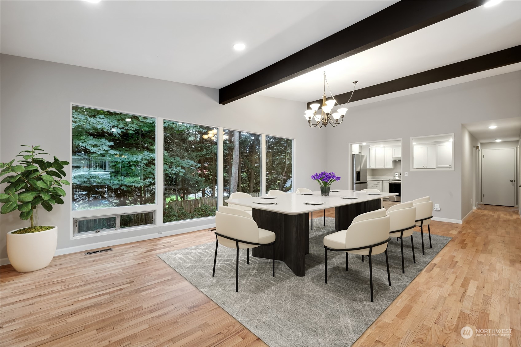2130 242nd Street Southwest Bothell, WA 98021 - Photo 15 of 40 a dining room with furniture and wooden floor