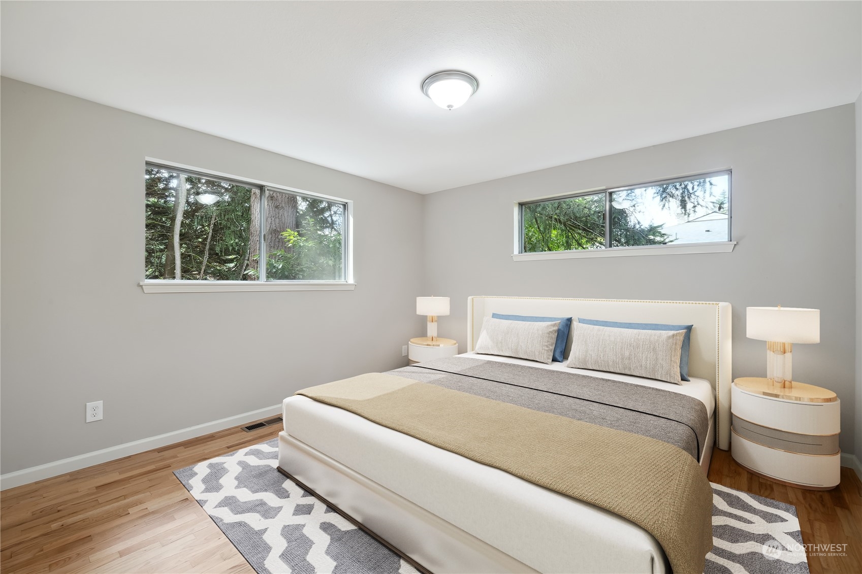 2130 242nd Street Southwest Bothell, WA 98021 - Photo 19 of 40 a bedroom with a bed and a window
