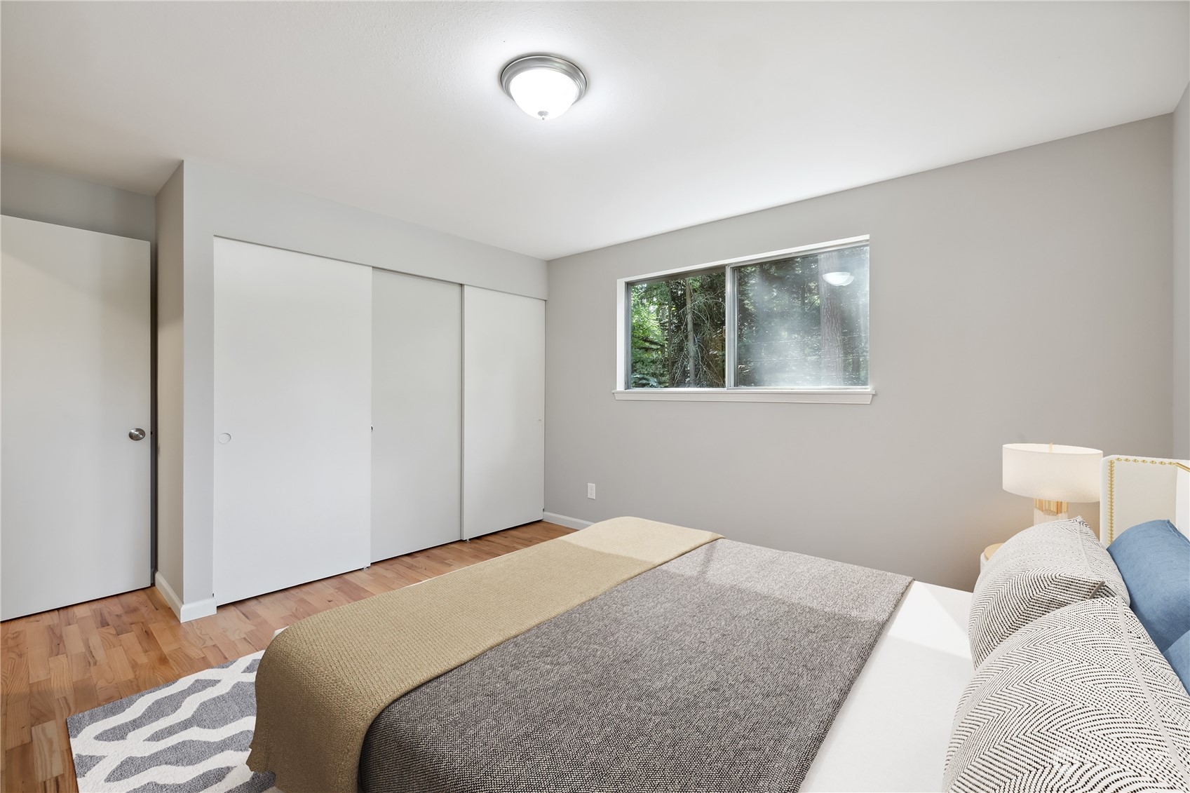 2130 242nd Street Southwest Bothell, WA 98021 - Photo 20 of 40 a bedroom with a bed and a window