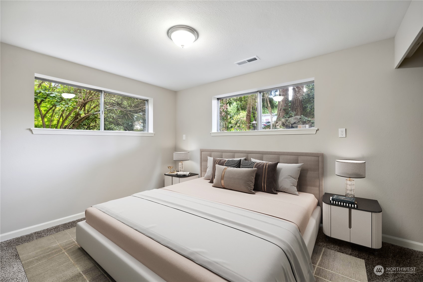 2130 242nd Street Southwest Bothell, WA 98021 - Photo 24 of 40 a bedroom with a bed and a painting on the wall