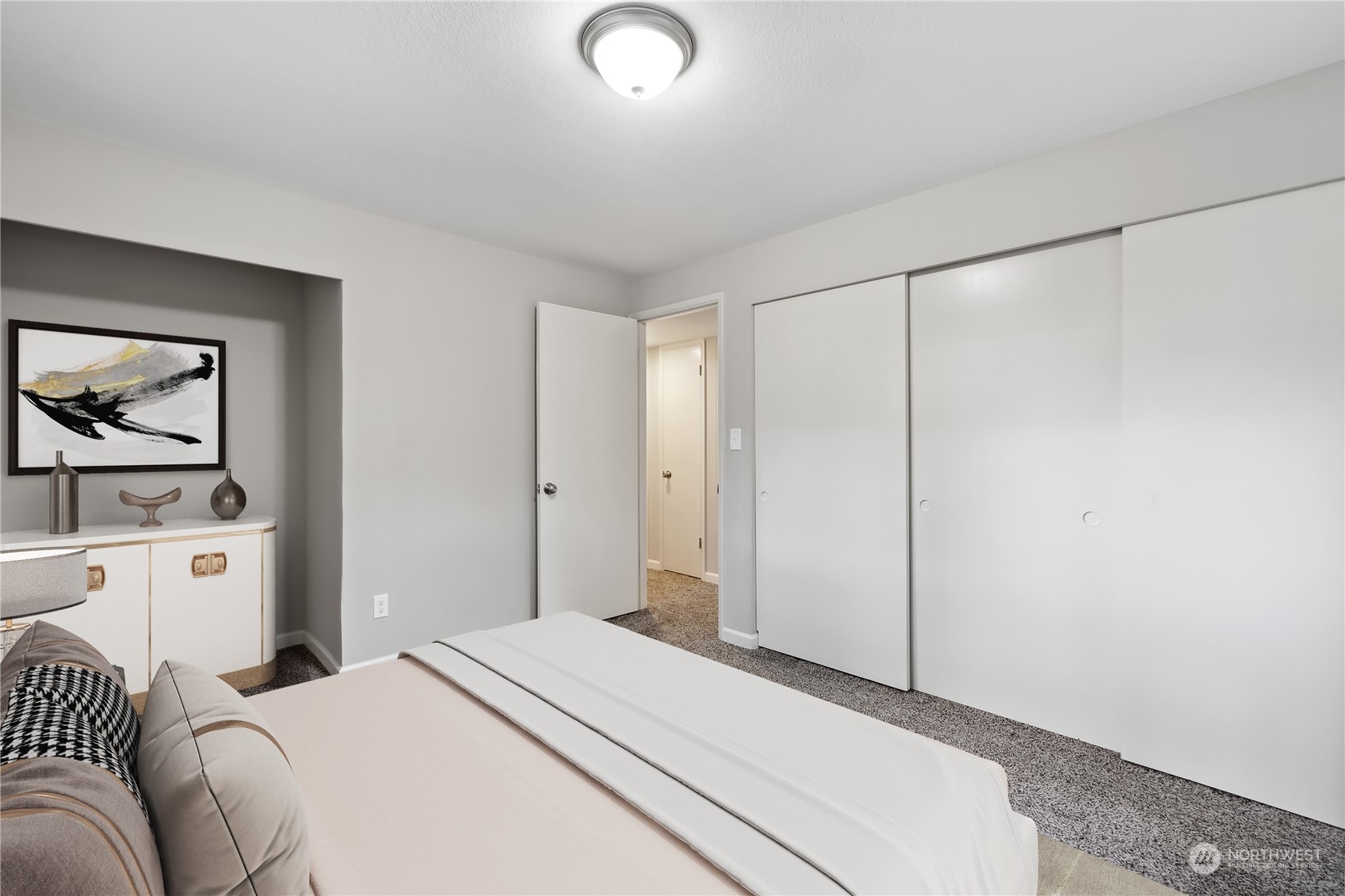 2130 242nd Street Southwest Bothell, WA 98021 - Photo 25 of 40 a bedroom with a bed and a painting on the wall
