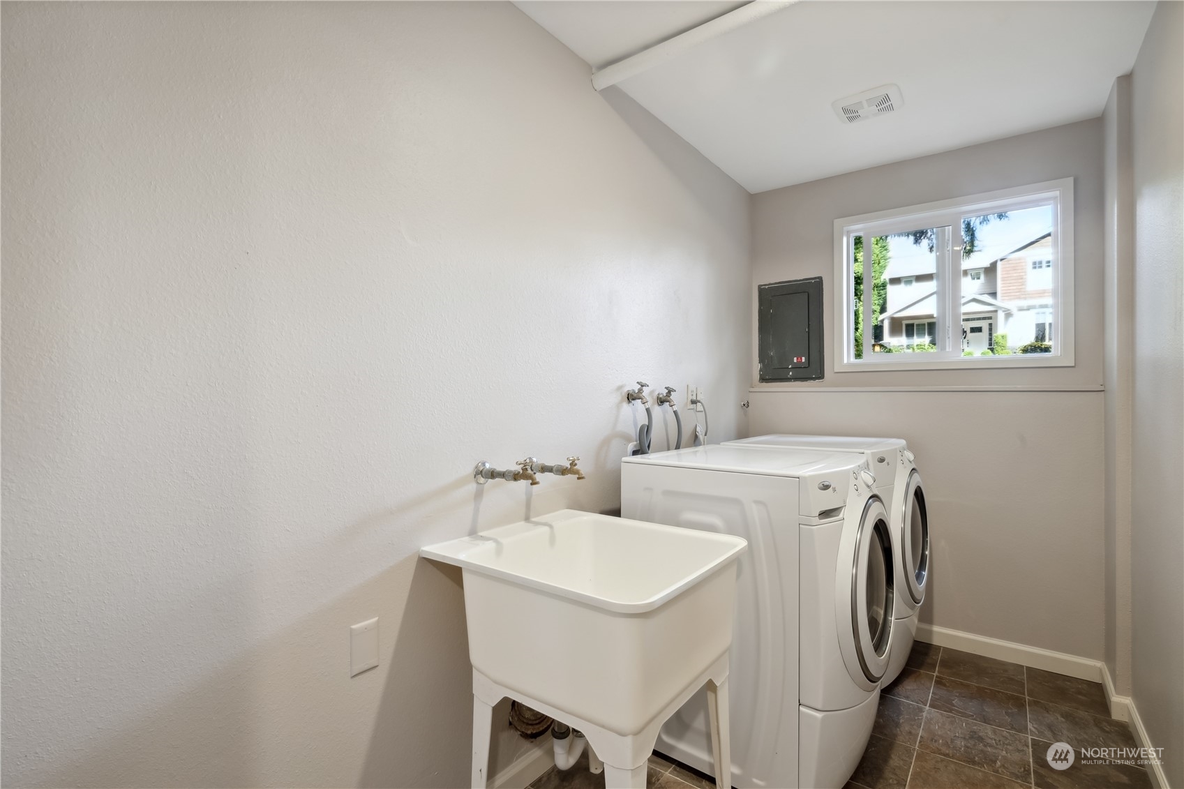 2130 242nd Street Southwest Bothell, WA 98021 - Photo 32 of 40 a utility room with dryer and washer