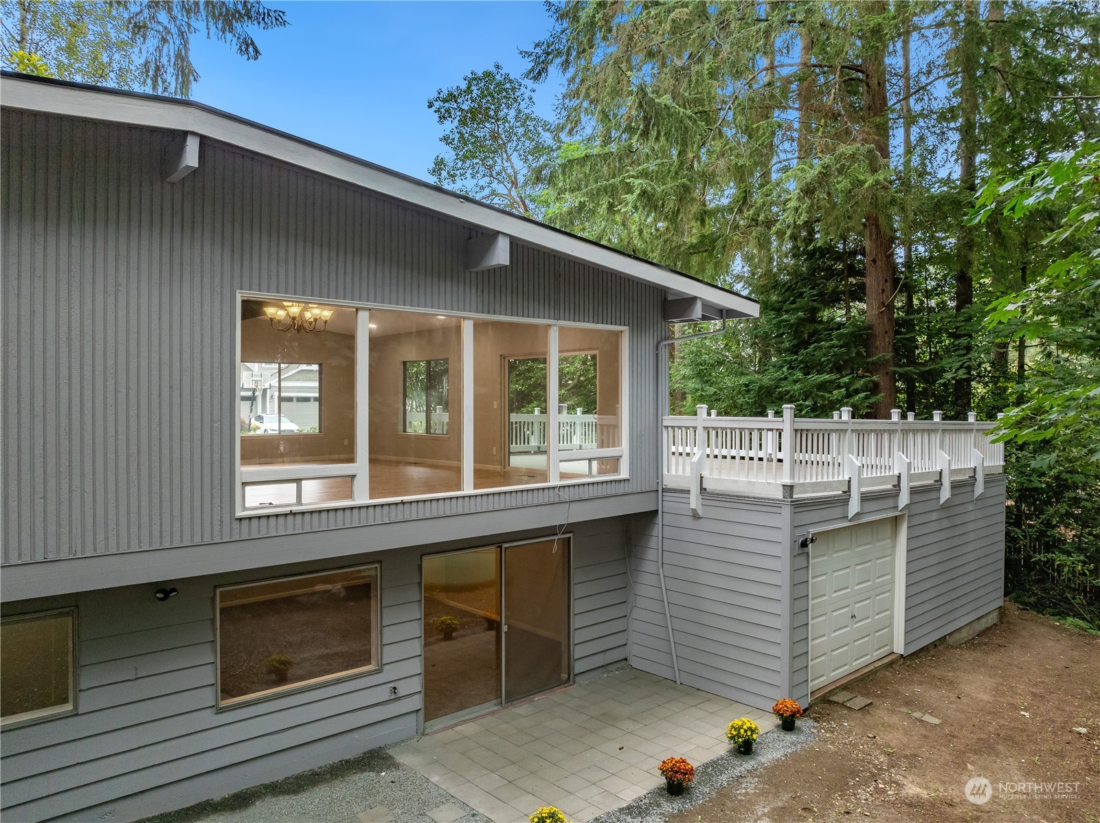 2130 242nd Street Southwest Bothell, WA 98021 - Photo 33 of 40 a view of a house with a backyard and balcony