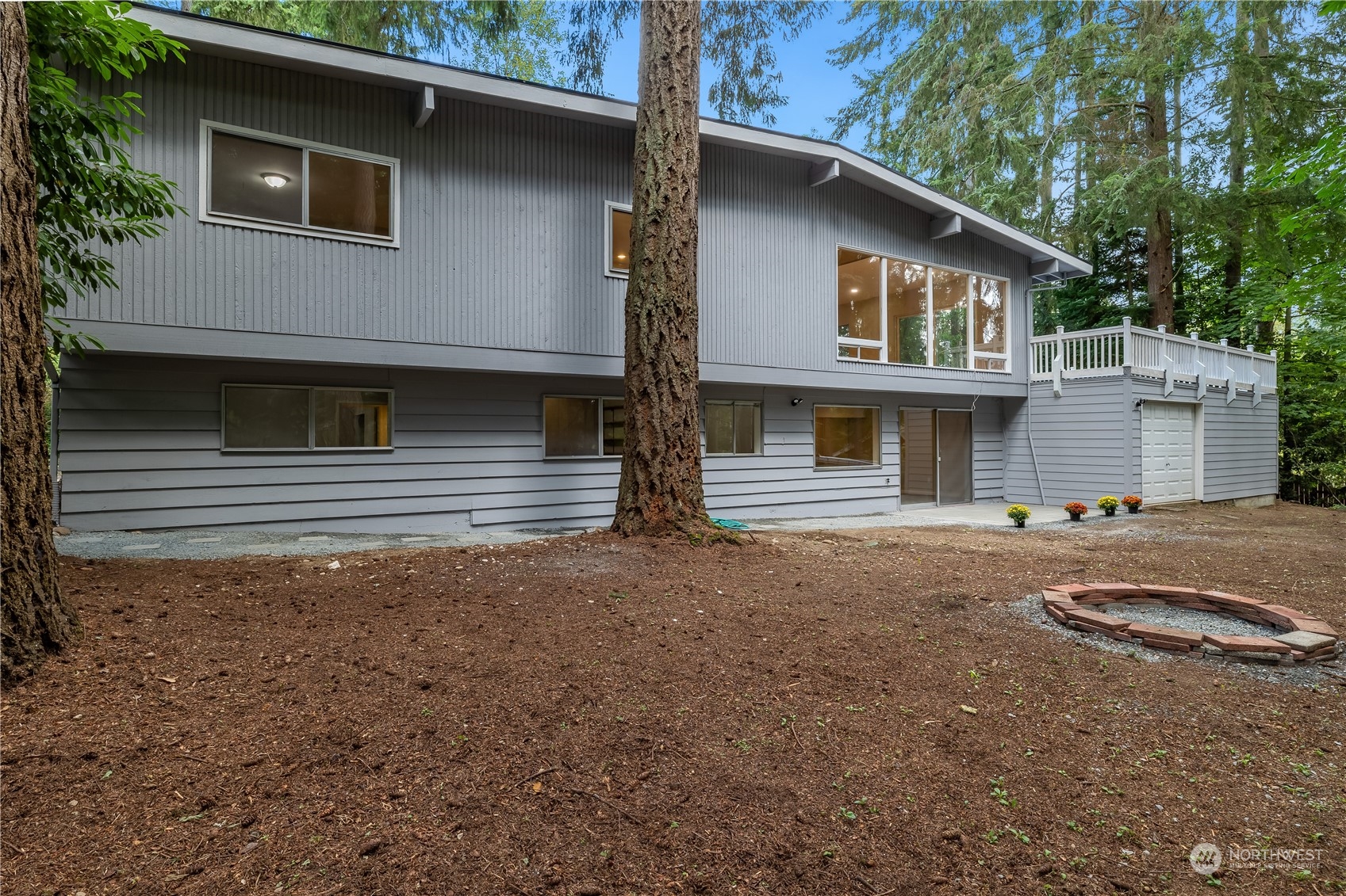 2130 242nd Street Southwest Bothell, WA 98021 - Photo 34 of 40 a front view of a house with garden