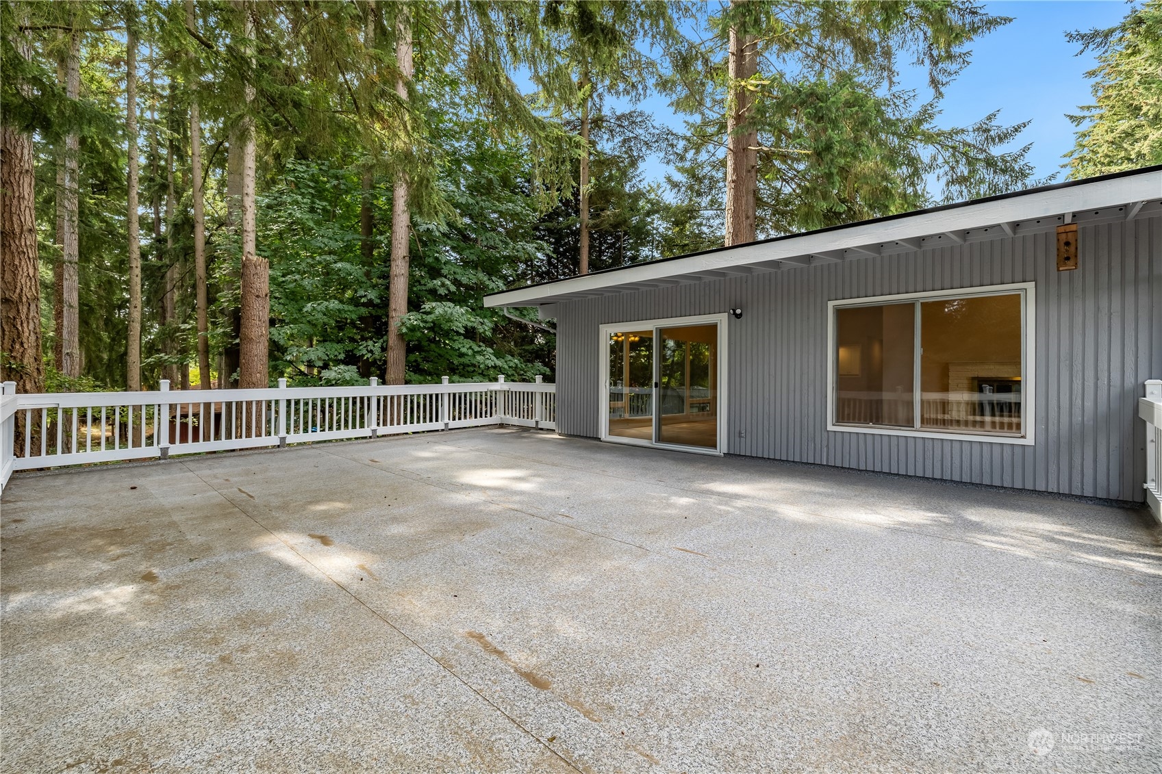 2130 242nd Street Southwest Bothell, WA 98021 - Photo 9 of 40 a view of a house with a backyard and porch