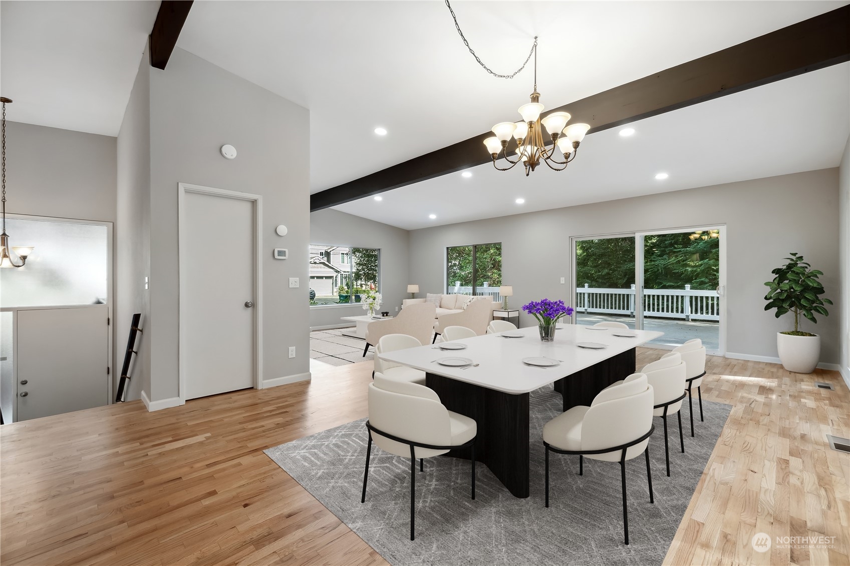 2130 242nd Street Southwest Bothell, WA 98021 - Photo 10 of 40 a view of a dining room with furniture window and wooden floor